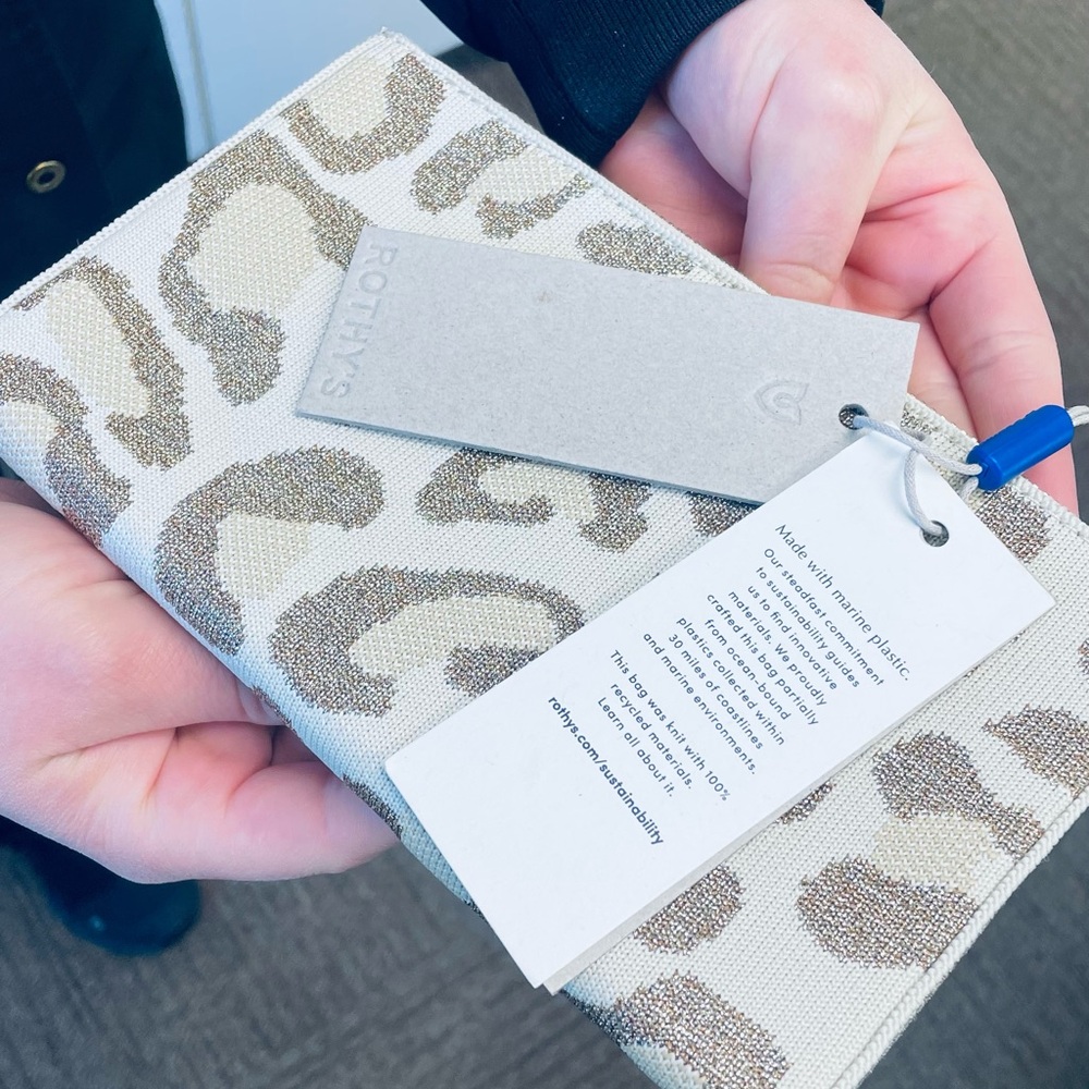 Rothy Clutch is NWT. Color is gold leopard. Never used!